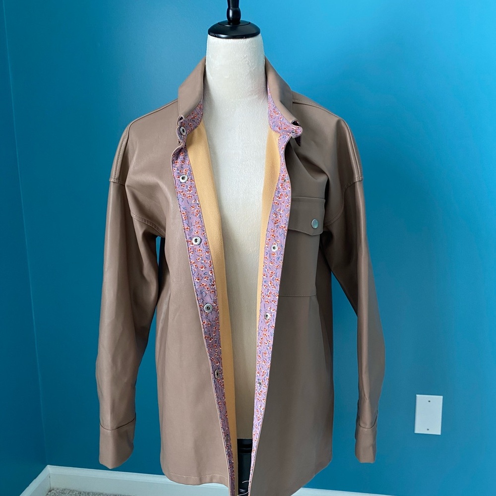 Brown Leather Jacket with Pink Accents and Wide Lapels